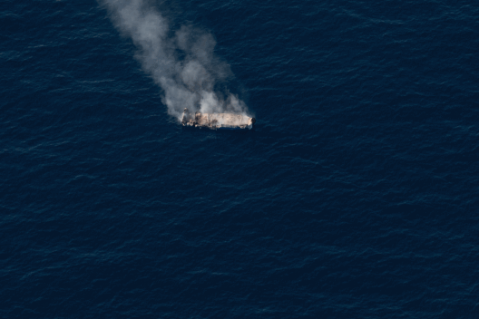 The smouldering remains of a boat set ablaze, a clear sign of an interception. When boats in distre