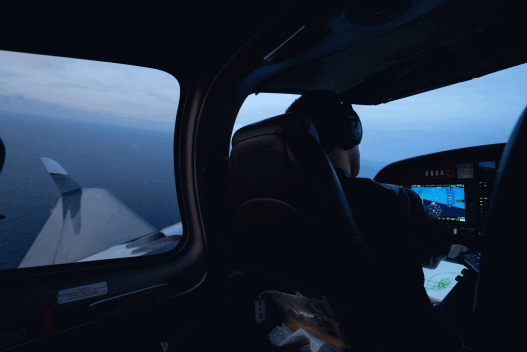 The crew of ALBATROSS UNO in flight over the Central Mediterranean.